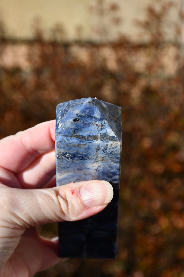 Sodalite and sunstone obelisk