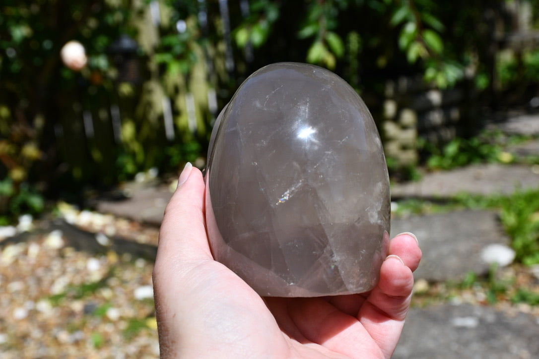 Smoky or blue rose quartz Madagascan style skull carve