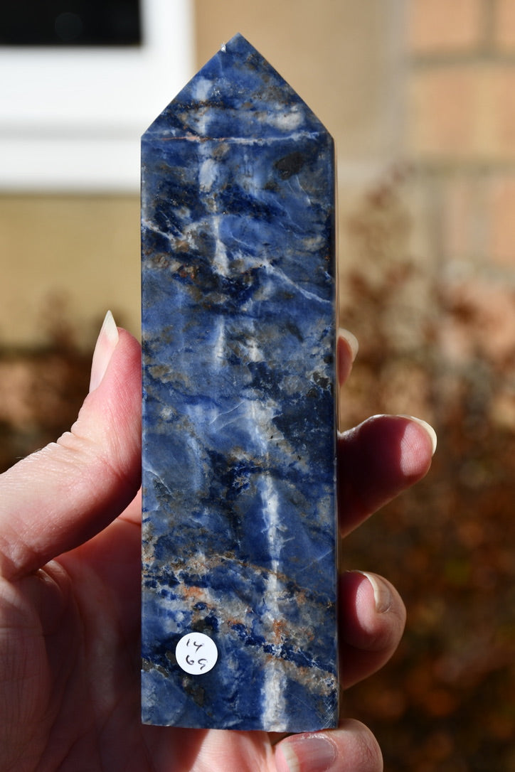 Sodalite and sunstone obelisk