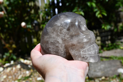 Smoky or blue rose quartz Madagascan style skull carve