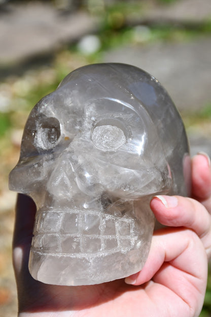 Smoky or blue rose quartz Madagascan style skull carve