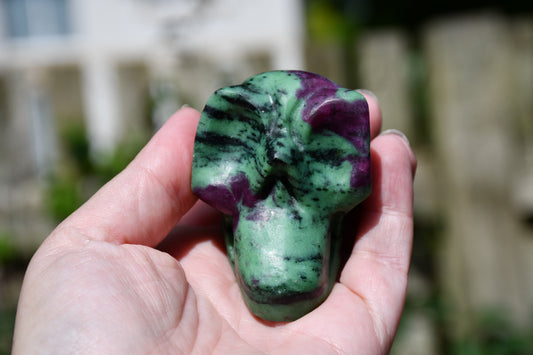 Ruby in zoisite Manus skull carve