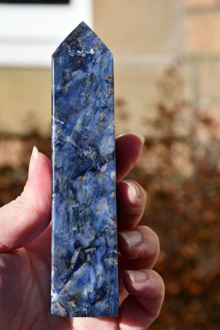 Sodalite and sunstone obelisk