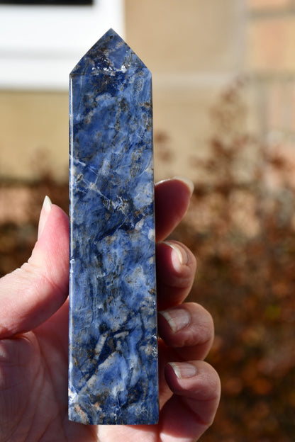 Sodalite and sunstone obelisk
