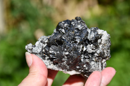 Black tourmaline and quartz cluster