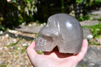 Smoky or blue rose quartz Madagascan style skull carve