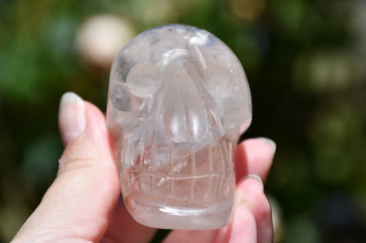 Phantom hematoid quartz either Nepalese (or Brazilian) skull carve